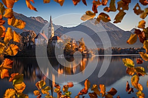 Bled, Slovenia - Beautiful autumn sunrise at Lake Bled with the famous Pilgrimage Church of the Assumption of Maria