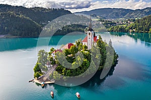 Bled, Slovenia - Beautiful morning at Lake Bled Blejsko Jezero with the Pilgrimage Church of the Assumption of Maria photo