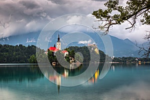 Bled, Slovenia - Beautiful morning view of Lake Bled Blejsko Jezero with the Pilgrimage Church of the Assumption of Maria photo