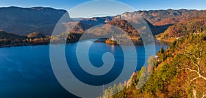 Bled, Slovenia - Panoramic skyline view of Lake Bled with warm autumn foliage