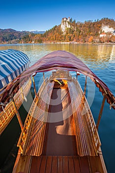 Bled, Slovenia - Traditional slovenian pleatna boat at Lake Bled Blejsko jezero photo