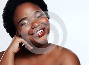 Blemish free skin is the hallmark of beauty. Studio shot of a beautiful young woman posing against a grey background.