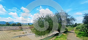 a blend of river of mountain trees and clear sky. so beautiful