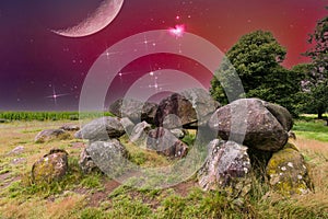 Blended image of a night view with dolmen and starry sky and supermoon