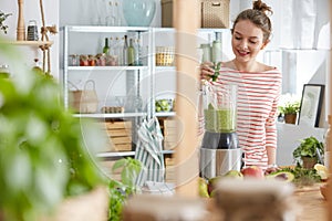 Blending smoothie ingredients