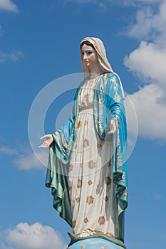 The Blessed Virgin Mary in front of the Roman Catholic Diocese that is public place.