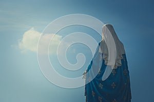 The Blessed Virgin Mary statue standing in front of The Cathedral of the Immaculate Conception at The Roman Catholic Diocese.