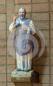 Blessing priest statue at San Lorenzo Seminary church, Santa Inez, CA, USA