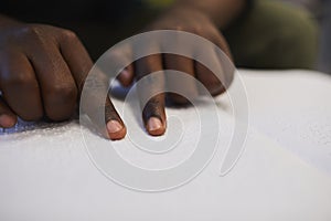 Blind Man Reading Braille Book