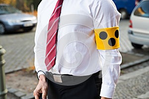 Blind person wearing armband