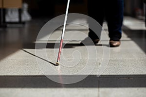 Blind person with white cane, Disability concept