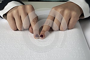Blind reading text in braille language