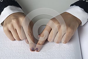 Blind reading text in braille language