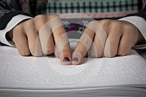 Blind reading text in braille language
