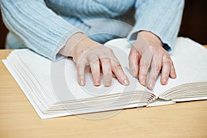 Blind or visually handicapped reading book photo