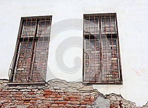 Blind winows of an old ruined building
