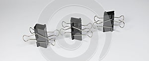 Blinder clips on white background