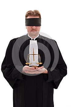 Blindfold lawyer with golden scale of justice photo
