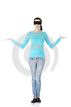 Blindfold woman presenting copy space