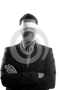 Blindfolded businessman over white background