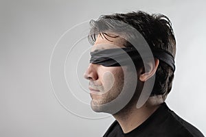 Blindfolded man