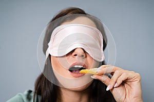 Blindfolded Young Woman Testing Food