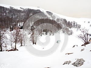 Blinding white of the snow, mountain landscape in the cold photo