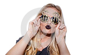 Bling bling. an unconventional blonde woman wearing bling sunglasses.