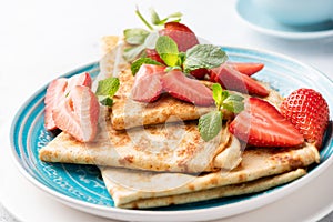 Blini or crepes with strawberry
