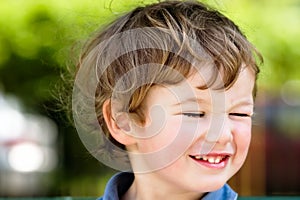 Blinking boy photo
