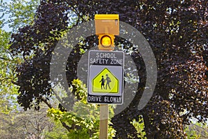 Blinking school safety zone sign
