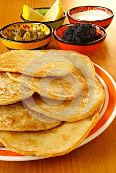 Blintzes with caviar