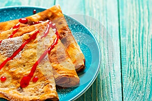 Bliny served on ceramic plate