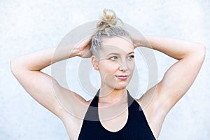 Blissful Stretching: Relaxed Blonde Woman