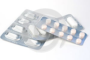 Blisters with medicines on a white background