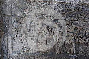 Blitar, East Java, Indonesia - April 25th, 2021 : Ancient relief on the stone of penataran temple, Blitar, East Java Indonesia