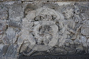 Blitar, East Java, Indonesia - April 25th, 2021 : Ancient relief on the stone of penataran temple, Blitar, East Java Indonesia