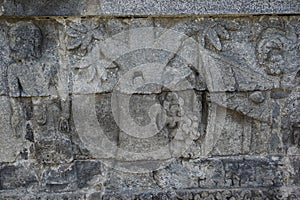 Blitar, East Java, Indonesia - April 25th, 2021 : Ancient relief on the stone of penataran temple, Blitar, East Java Indonesia