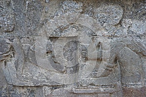 Blitar, East Java, Indonesia - April 25th, 2021 : Ancient relief on the stone of penataran temple, Blitar, East Java Indonesia