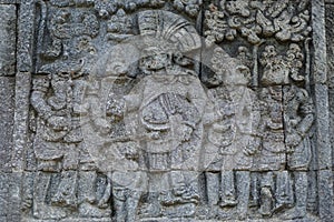 Blitar, East Java, Indonesia - April 25th, 2021 : Ancient relief on the stone of penataran temple, Blitar, East Java Indonesia