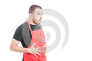 Bloated supermarket employee with abdominal pain