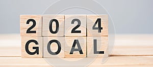 block 2024 GOAL text on table. Resolution, strategy, plan, motivation, reboot, business and New Year holiday concepts