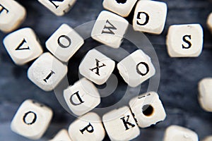 Block of alphabet studded on the floor