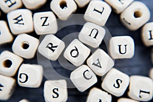 Block of alphabet studded on the floor