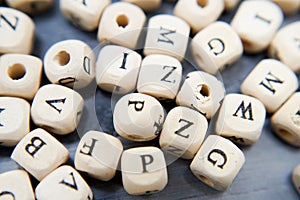 Block of alphabet studded on the floor