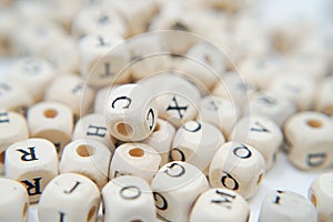 Block of alphabet studded on the floor