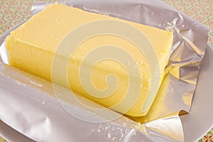 Block of butter unwrapped