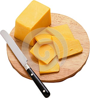 Block of cheese on cutting board with a knife