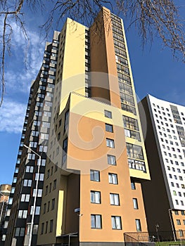 Block of flats, modern residential high-rise buildings in Russia. Real estate market concept. Apartment building.