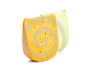 Block of hard cheese with chili and wasabi flavor
